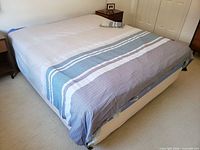Duvet cover displayed on queen bed