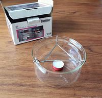 Teapot warmer assembled beside original box