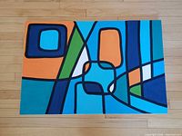 Full view of painting front showing abstract design and colors