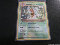 Front of Beedrill 7/108 reverse holo card in sleeve