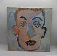 Front cover showing abstract painted portrait artwork