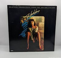 Front album cover showing Flashdance artwork
