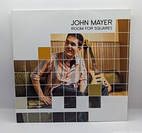 Front cover showing John Mayer image and title