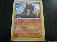 Front of Kabutops 39/124 card showing artwork, stats and text