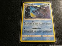 Front view of Kingdra holographic card in sleeve