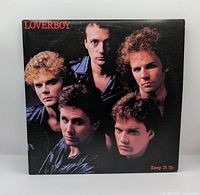 Front jacket showing title and band photo