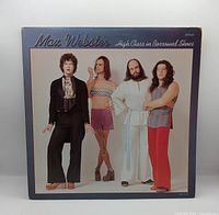 Front jacket showing Max Webster photo and album title