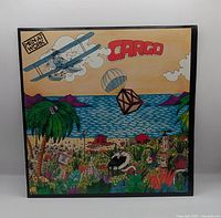 Front album cover showing title Cargo and artwork