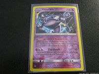 Front of sleeved Mewtwo Reverse Holo card