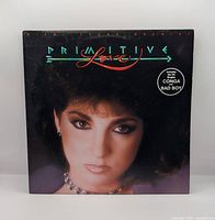 Front jacket showing album art and title