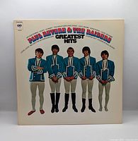 Front sleeve showing title and band image