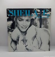 Front picture sleeve with artist portrait and title