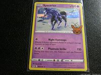 Front view of Spectrier holographic card in sleeve