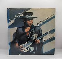 Front album cover with title and artist