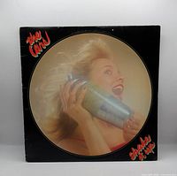 Front picture sleeve of The Cars Shake It Up LP