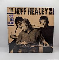 Front album jacket with band photo and title