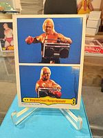 Front of Hulk Hogan card on stand, full view of two-panel image