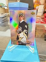 Front of Sidney Crosby rainbow holographic rookie card on stand