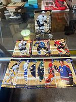 Group shot of ten Power Play rookie hockey cards including Sidney Crosby upright and nine others laid flat