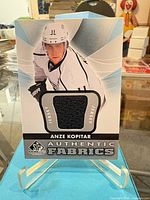 Card front showing player image and fabric swatch