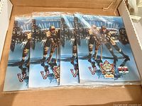 Box containing four sealed 2014 Heritage Classic programs