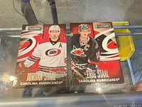 Front view of both cards showing players and team graphics