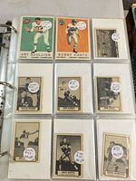 Binder page with Topps colour and vintage black-and-white CFL cards