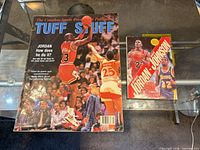 Front covers of magazine and paperback side by side