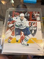 Entire 8x10 photograph inside protective sleeve