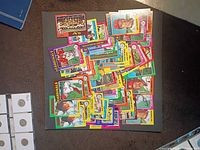 Pile of approx. 50 1975 Topps cards showing variety of border colors and team representation