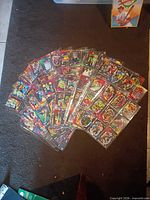 Fan display of multiple plastic pages filled with Marvel Team-Ups cards