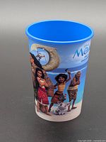 Cup front showing Moana characters and blue interior