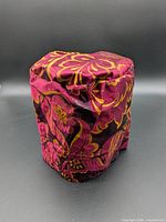 Full view of pouch exterior showing floral fabric