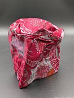 Overall view of fabric container showing floral pattern