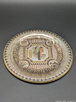 Full view of round Egyptian decorative metal plate