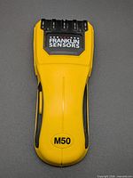 Front view of yellow Franklin Sensors M50 stud finder