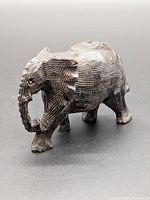 front-side view of carved wooden elephant