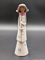Full view of ceramic girl bud vase figurine