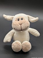 Front view of plush lamb toy