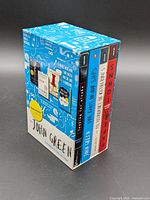 Slipcase showing spines of all four John Green novels