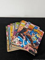 Stack of comic books, top issue Sleepwalker