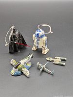Group shot of all five Star Wars ornaments and mini ships