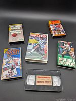 Six VHS tapes laid out showing titles and cassette