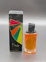 Bottle and box front view showing product and fill level