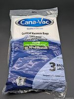 Front of sealed Cana-Vac package showing brand, HEPA rating, pack of 3