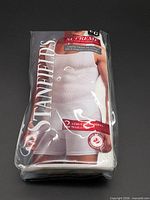Front of sealed package showing brand, product image and quantity
