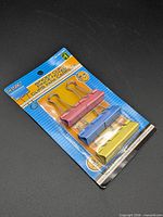 Front view of sealed 6-pack pastel binder clips on retail card