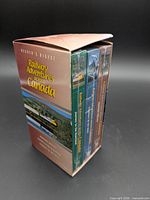 Box set angled view showing outer sleeve and three sealed VHS tapes