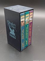 Front view of slipcase with three VHS tapes visible