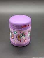 Front view of purple Thermos FUNtainer food jar showing unicorn graphics